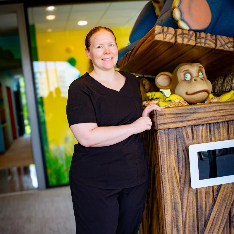 Parent reading a children's dental storybook before first visit
